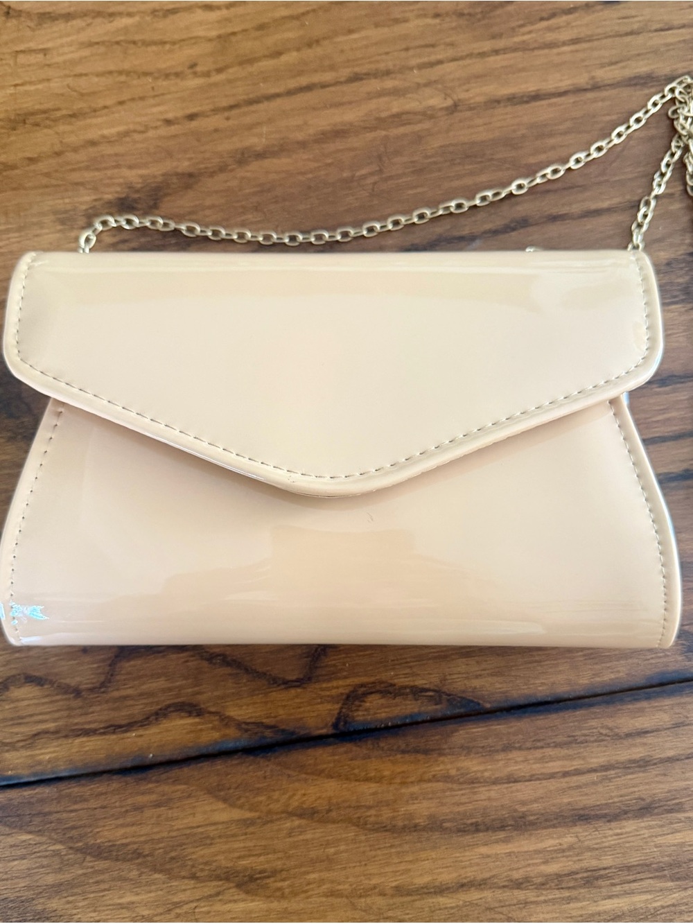 Sleek Patent Wristlet Clutch in Nude Patent